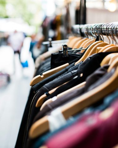 selective focus photography of hanged clothes