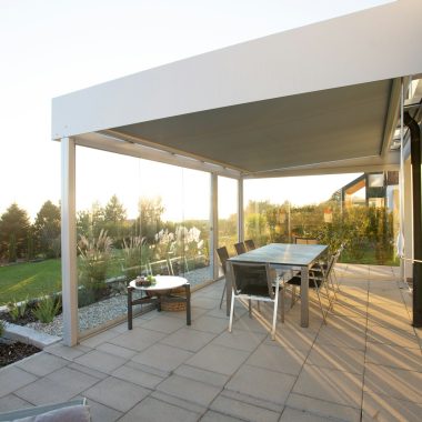 black metal table and chairs on green grass field during daytime